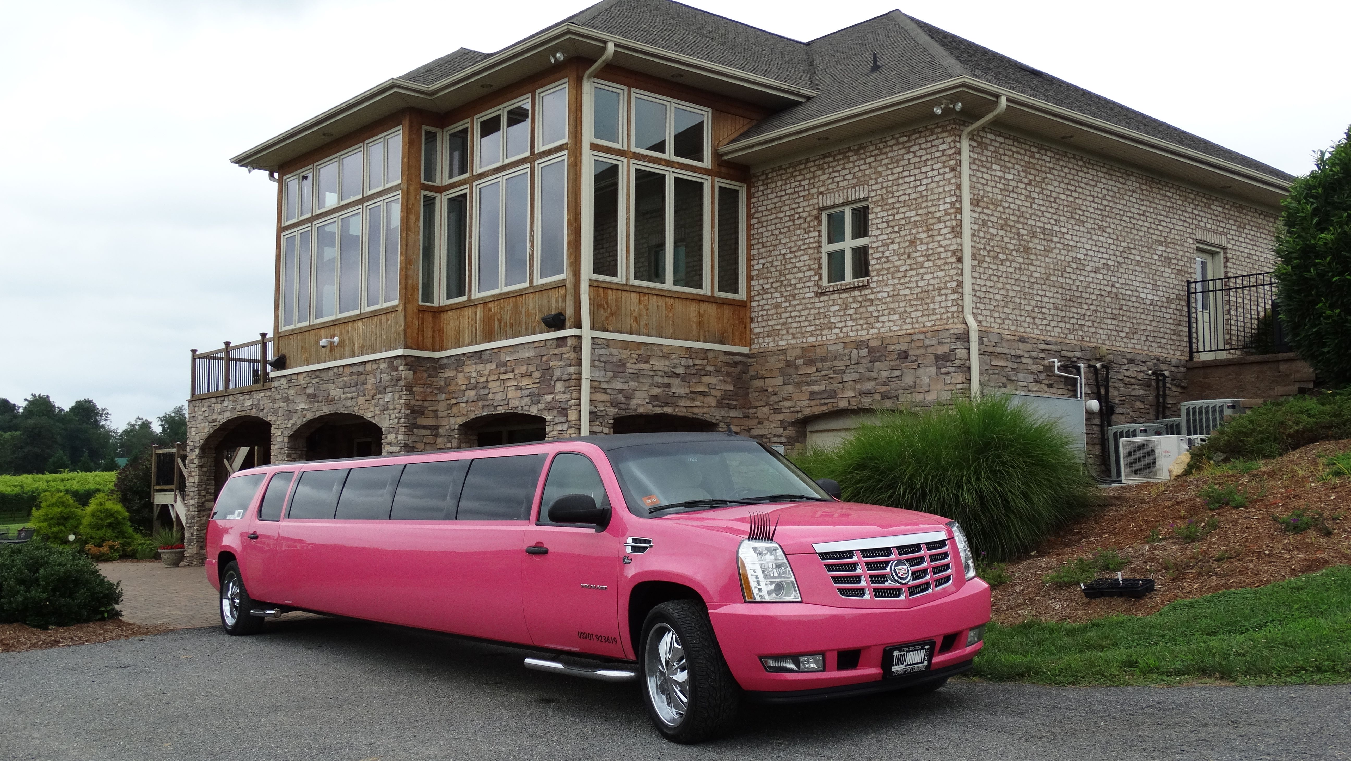 Carolina Luxury Transportation Group pink limo at Shadow Springs for an NC Winery Tour